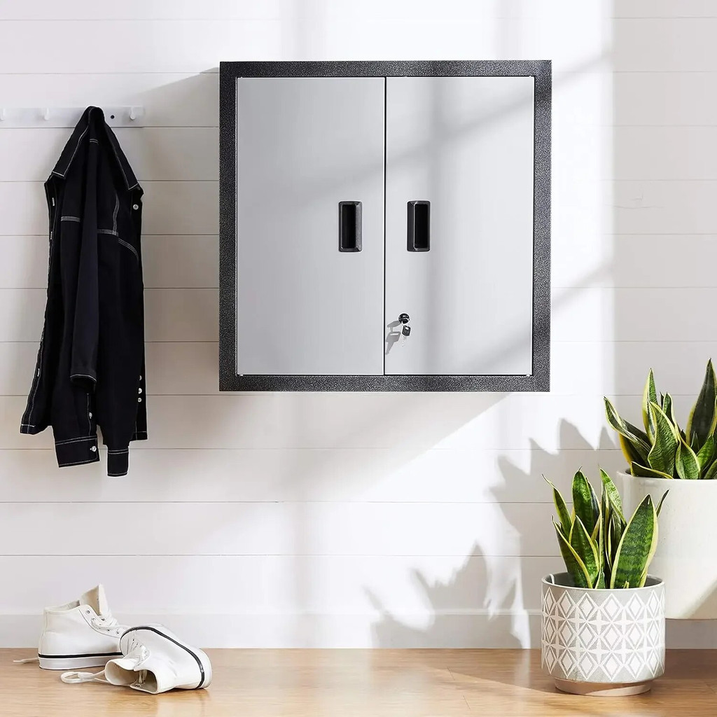 Wall-mounted grey storage cabinet with two doors in a bright room